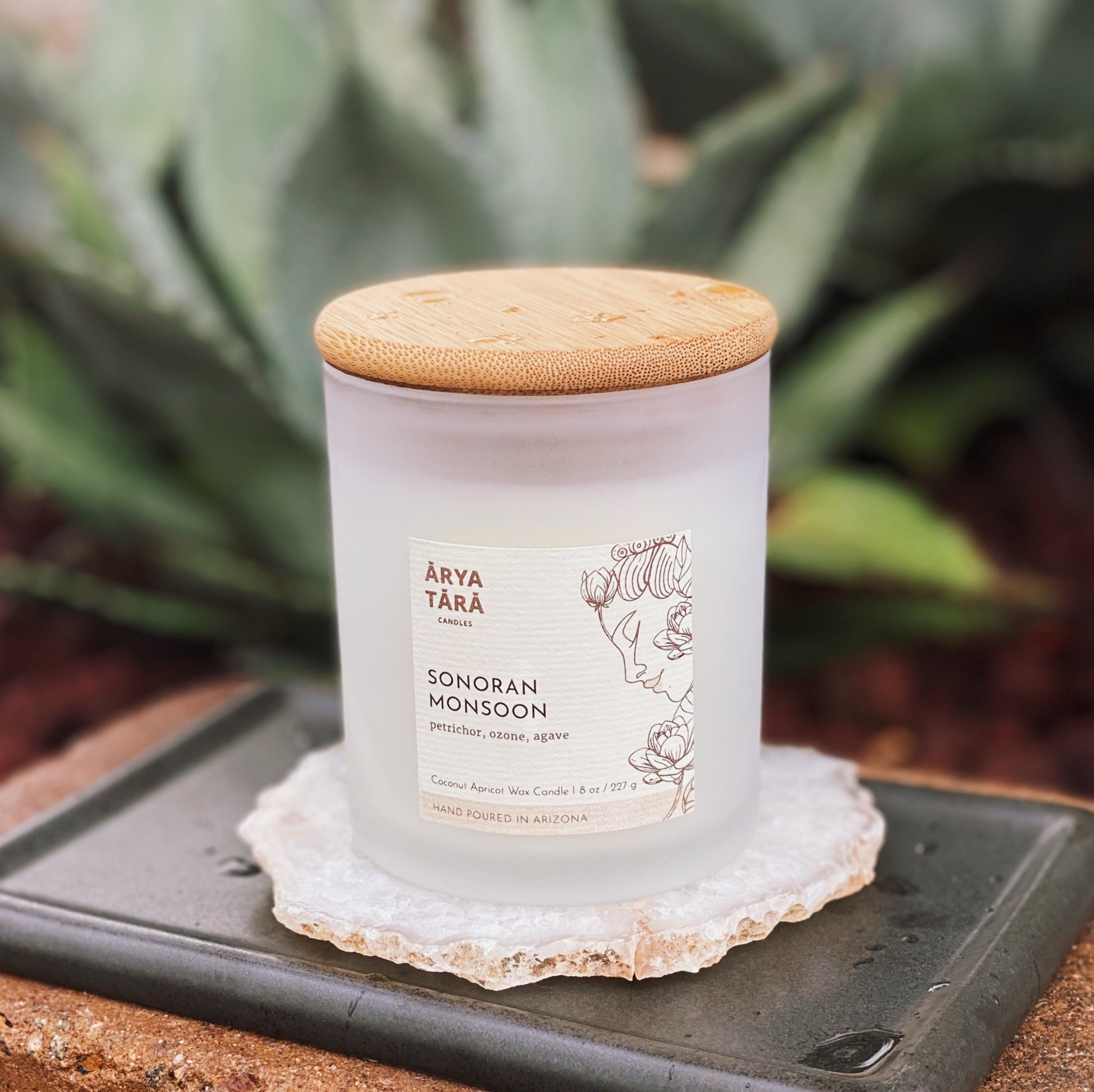 Sonoran Monsoon Candle by Arya Tara Candles. Humid desert air, damp clay soil and agave leaves showered with raindrops. Ozone, petrichor, agave leaves. Arizona inspired candle. Monsoon rain scent. Luxury candle, natural candle. Made in Tucson Arizona, hand poured candle in small batch. Non-toxic natural candle made with coconut apricot wax, lead-free zinc-free wicks, premium fragrances.